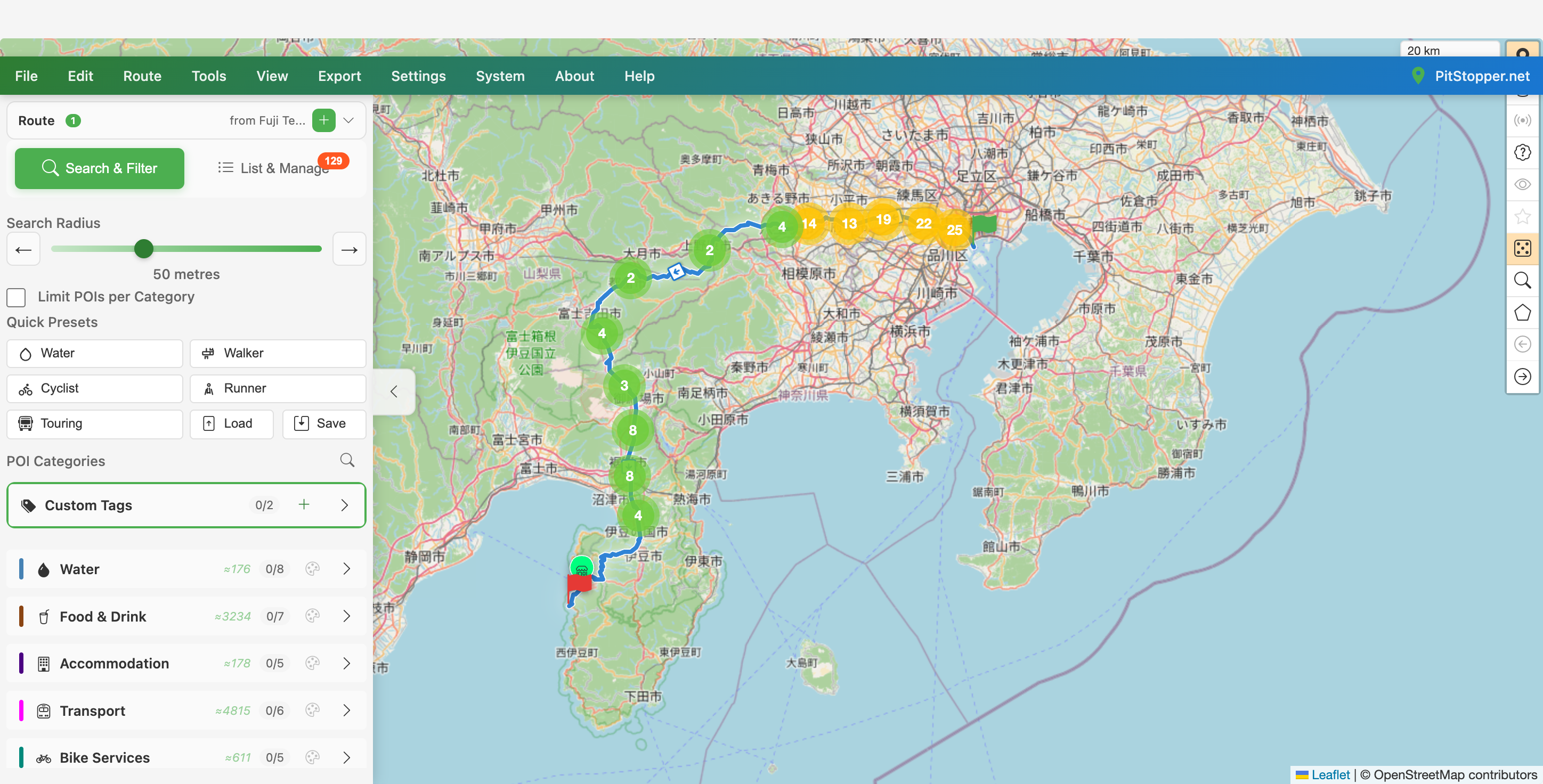 PitStopper showing the full route from Tokyo Bay to Suruga Bay with 129 roadside convenience stores clustered along it at a 50 m radius